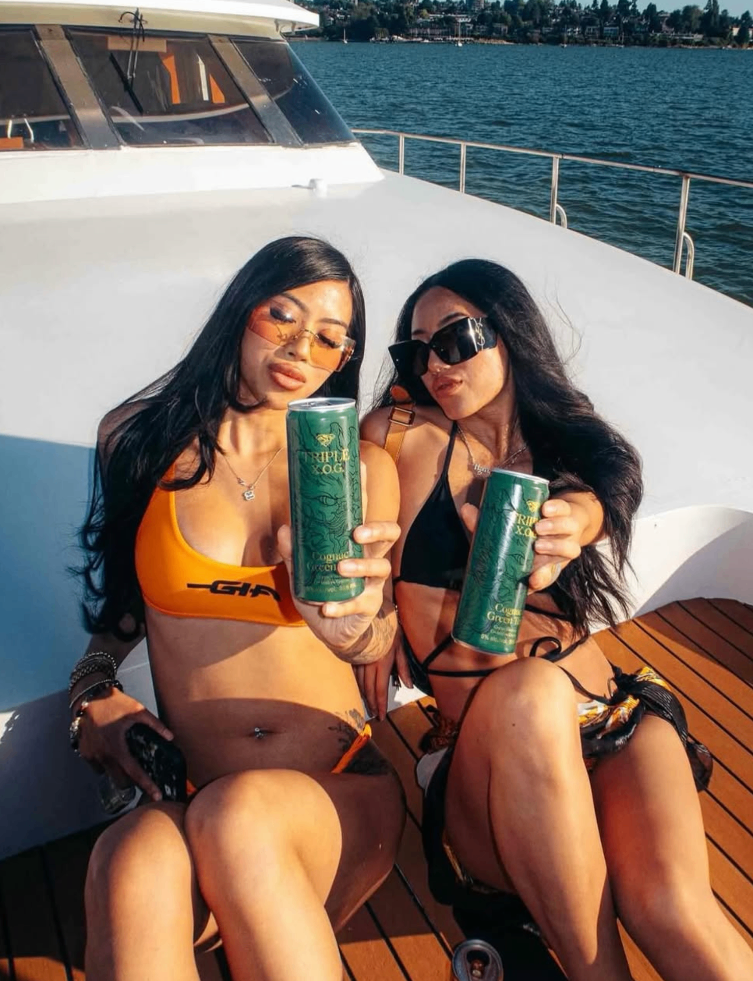 Ambassadors on a yacht with Triple X.O.G.